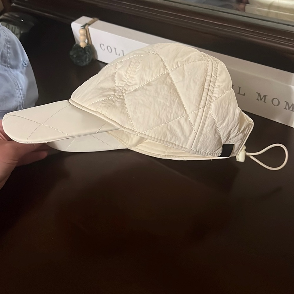 Cream colored padded ball cap